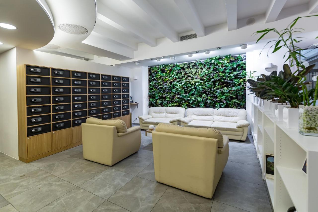 Merchants Crown Suites And Spa Prag Exteriör bild Green wall in a modern office